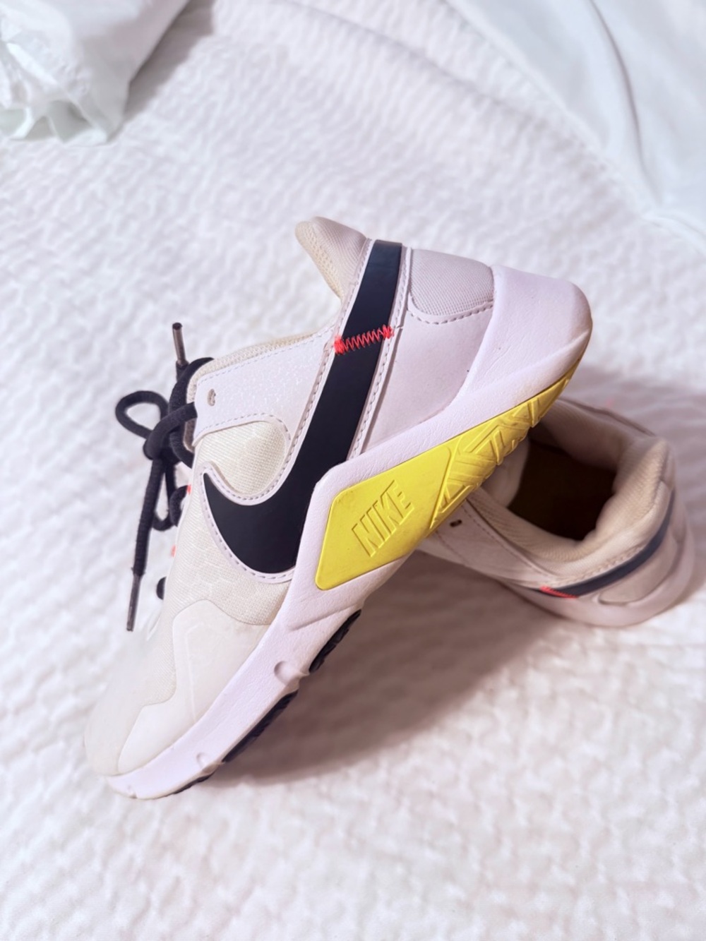 Nike Women's Light Beige Sneakers with Black Swoosh and Yellow Accent